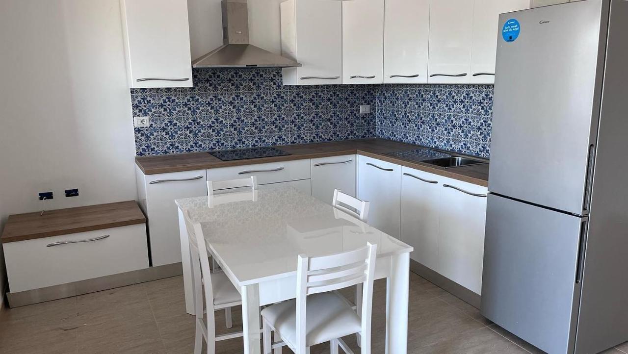 Residence Le Maree Porto Pino Eksteriør bilde